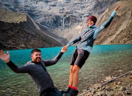 Photo of two people at the water in Peru